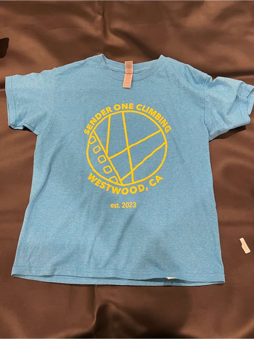 Gildan Light Blue Kids Tee with Yellow Climbing Logo